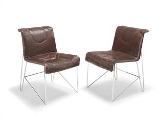 2167
Guido Faleschini (1924-1971)
A pair of side chairs for Pace Collection, circa 1970s
With fabric to underside possibly bearing designer's initials in a pattern: GF
The tubular polished nickel frames, each with a brown leather upholstered sling seat
2 pieces
Each: 32.25" H x 21" W x 26" D
Estimate: $300 - $500