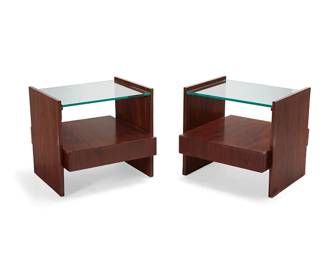 2140
A pair of Modern side tables
Late 20th/early 21st century
Each unmarked
The wood veneered tables, each with glass top above a single drawer
2 pieces
20" H x 21.5" W x 21.75" D
Estimate: $500 - $700