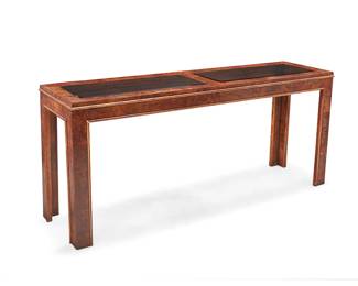 2275
A Glenn of California burlwood entry table
Late 20th century
The console table with two inset smoky glass panels
27.5" H x 61" W x 17" D
Estimate: $400 - $600