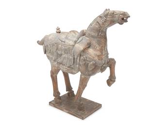 2220
A large Chinese Tang-style carved wood horse figure
20th century
With a whitewash finish, mounted to a wood base
48.5" H x 51.5" W x 17.5" D
Estimate: $500 - $700