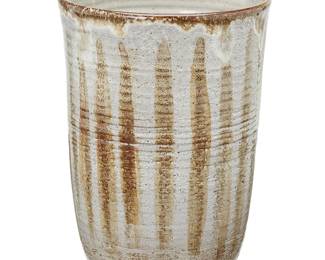 2112
Antonio Prieto (1912-1967)
A glazed studio pottery vase, mid-20th century
Incised to underside: A PRIETO
The stoneware vase with textured glaze and horizontal sgraffito lines
7.75" H x 5.25" Dia.
Estimate: $200 - $300