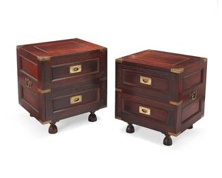 2128
A pair of M. Hayat Brothers rosewood nightstands
Circa 1960; Peshawar, Pakistan
Each with metal inlaid scroll ornamentation, featuring two locking drawers, with brass mounts, opposed side handles, and drawer pulls, raised on cupped feet
2 pieces
Each: 23" H x 21.25" W x 18" D
Estimate: $500 - $700