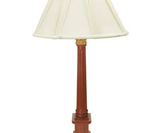2261
David Linley (b. 1961)
A Neoclassical-style wood table lamp, circa 1995
Impressed to lower standard: LINLEY
The single-light lamp with Corinthian columnar standard and architectural tiered base, surmounted by a pleated fabric shade, electrified
Lamp without harp: 27.25" H x 8" W x 8" D; Shade: 11" H x 17.25" Dia.
Estimate: $300 - $500