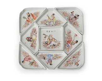 2230
A Chinese porcelain sweet-meat set
20th century
Central tray with Chinese inscription
The nine-piece set of enameled ceramic dishes, each depicting figural scenes, set in a glazed wood box
Overall: 3" H x 11.25" W x 11.25" D
Estimate: $300 - $500