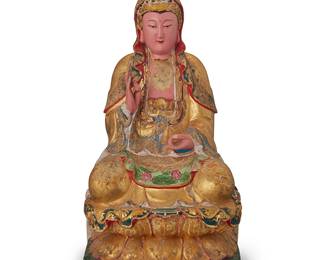 2217
An Asian polychrome carved wood figure of Guanyin
20th century
The painted and gilt figure depicted seated with hands in vitarka mudra
16" H x 8.5" W x 7.25" D
Estimate: $300 - $500