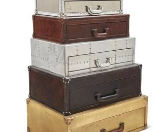 2285
A Contemporary stacked suitcase dresser
Late 20th/early 21st century
Each leather or metal-clad case lined with fabric to interior, the topmost with a hinged lid and the lower five each fitted with drawers
49" H x 32" W x 23" D
Estimate: $400 - $600