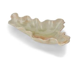 2092
An onyx specimen bowl
20th/early 21st century
With semi-translucent center and clouded banding to rim
5.5" H x 28.25" W x 16.5" D
18 lbs.
Estimate: $300 - $500