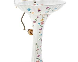 2254
A Les Bains Decorés shell-form porcelain pedestal sink
Late 20th century
Marked verso: Les Bains Decorés De Porcelaine / [crossed arrows] / De Paris France
With gold-toned metal faucet and fixtures, decorated in floral motifs, the basin in the form of a scallop shell
37.25" H x 24" W x 18.5" D
Estimate: $400 - $600