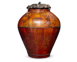 2237
A Chinese wood storage container
Late Qing Dynasty (1644-1912) or later
The body with gilt painted courtly figures, birds, and foliate motifs, surmounted by a carved hardwood lotus-form lid
17.5" H x 13.5" Dia.
Estimate: $800 - $1,000