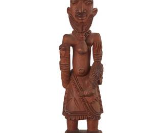 2125
Lamidi Olonade Fakeye (1925-2009)
A carved wood figure of a Yoruba man, late 20th century
Incised signature to underside: L. O FAKEYE
The figure depicted holding a bird
16.5" H x 4" W x 3.25" D
Estimate: $500 - $800