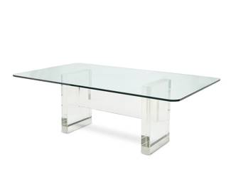 2036
Gary Strutin (b. 1938)
A Modern Lucite and glass table for Plastic Works, circa 1980s
With etched signature in the stretcher: Gary Strutin
The Lucite block base with lower bands of brushed metal, surmounted by a glass top
Overall: 28" H x 84" W x 46" D; Lucite: 27.5" H x 48" W x 18.25" D
Estimate: $700 - $900