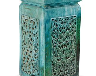 2221
An Asian-style glazed ceramic pedestal
20th century
With a turquoise glaze and scrolled openwork to each side
34.25" H x 19.25" W x 19.25" D
Estimate: $400 - $600