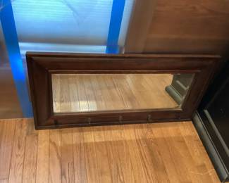Mahogany framed mirror with coat hooks