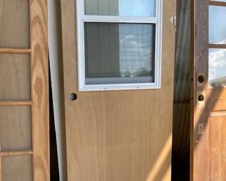 1/2 lite exterior door with raise and lower window