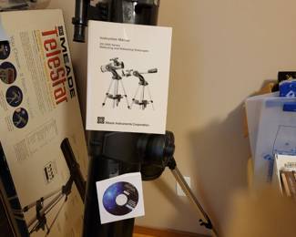 Telescope used once box and book