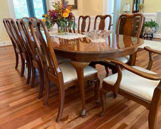 Queen Anne dining table seats ten fully extended with two leaves, includes table pads, 66” without the leaves, two leaves at 18” each, 102” fully extended
