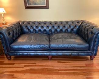 Stunning blue leather sofa with nailheads by Distinctive Chesterfields hand made in England, 90” long x 42” deep, looks barely used!