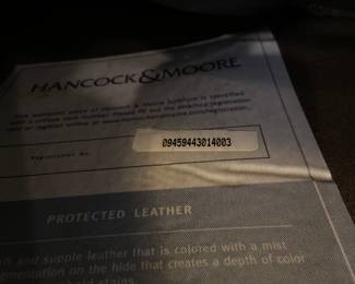 Hancock and Moore leather sofa with nailhead detail, 85” long x 36” deep