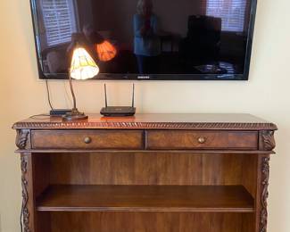 Lovely detailed cabinet, wall-mounted TV