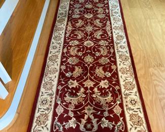 Runner 92” x 30” at foot of stair in basement