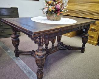 Much, much furniture-modern and antique!! Antique English craved oak w/pull-out leaf's.