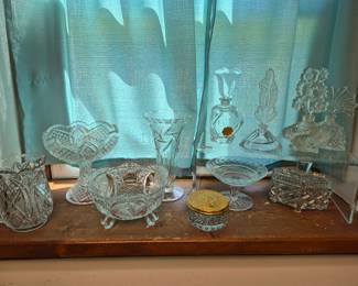 Clear pressed and cut glass. Perfumes