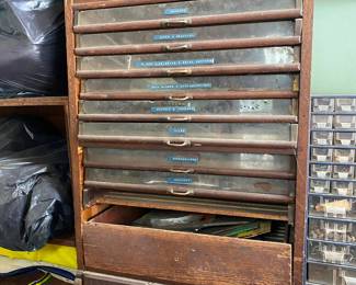 A VINTAGE SPOOL/THREAD CABINET