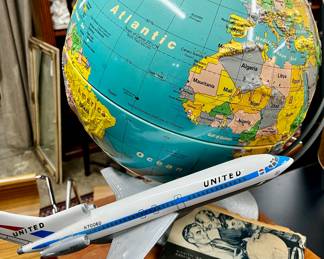 Around the world – United Airlines 727 model plane, vintage globe