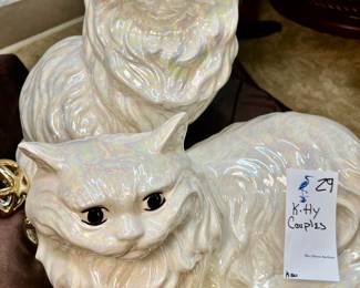 Kitty couples – two iridescent ceramic Persian cats in a basket with toys