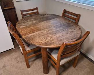 120 OvalDiningTableFourChairsExtraLeaf