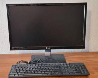 150 LGFlatronMonitorDellKeyboardWirelessHeadphonesPhoneStand