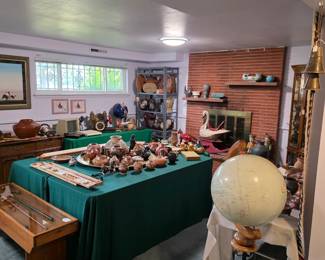 Lower level - Native American, baskets, pottery, inflatable globe on stand, Apple II monitor and keyboard
