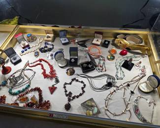 Included in this small representation of the jewelry selection: 1 carat yellow diamond pendant; antique Bohemian garnet necklace with photo frame; vintage diamonds rings, amber, coral, Georg Jensen, Butler & Wilson, Theodore Fahrner; lots of Native American turquoise and silver pieces