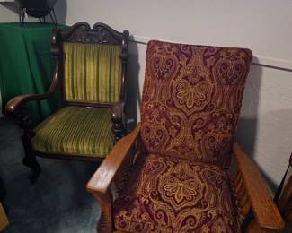 1900's oak reclining Morris chair and an antique upholstered carved wood armchair 