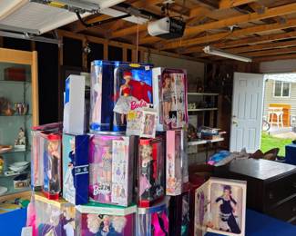 Tower of new-in-the- box vintage 1990's Barbie's. 