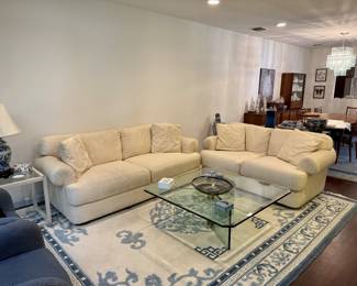 PAIR OF VINTAGE WHITE SOFAS, AREA RUG, COFFEE TABLE