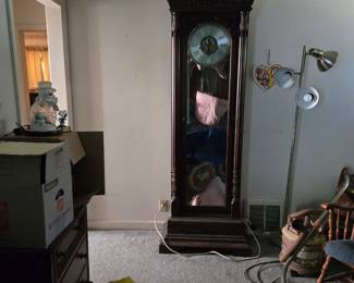 Grandfather clock, so many dvd's (mostly war and westerns), vhs tapes, filter queen vacuum 