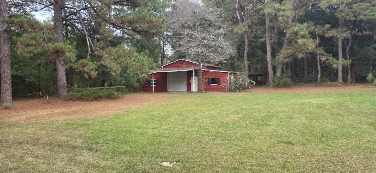 Sale to be held in large red barn on left side of home 