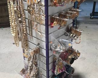 More necklaces, costume jewelry, clip on earrings, bracelets, brooches and pins