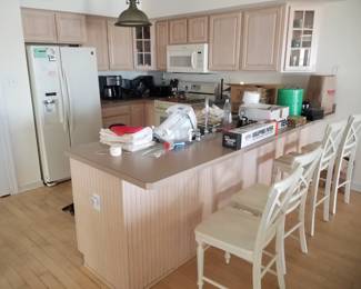 Two U-shaped kitchens - each a mirror image of the other. 