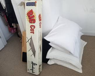 Big cot; pillows