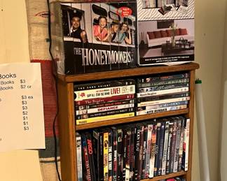 More DVDs with Mexican wall hanging behind
