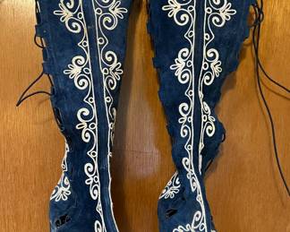 Groovy, vintage suede boots with white embroidery and lace up on both sides of leg.  Size 9.5