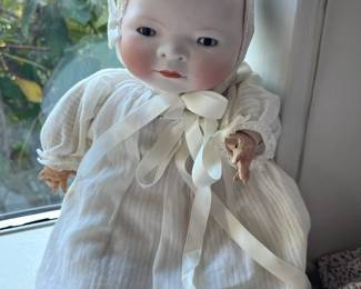 Bye-Lo bisque baby. Looks to be all original, but clothes may not be original. Very good condition