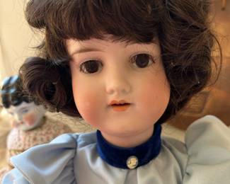 Armand Marseille AM3 mold. Open mouth with teeth. New dress. Very good condition
