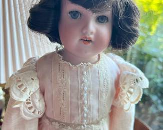 Germany 370 head mold; original kid body and antique dress. Open mouth with teeth. Very good condition