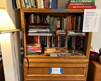 Only the books are for sale, not the cabinet