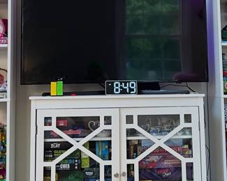 Samsung 48” Smart TV, glass doored cabinet, so many board games!