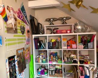 So much ART SUPPLIES! collage materials, scrapbook paper, contact paper, scissors, tape, glue, felt, cards, postcards, envelopes, ephemera, sewing patterns, posters, blankets canvases, stamps, ink pads, half started stuff, desk organizers, shadow box frames, lego wheels (we don’t make cars lol but have lots of spare parts), glass jars, paper cutters, cutting mat, drawing pencils, acrylic paints, water colors, oil paints, paper pads, cord board, markers, paint markers, SO MUCH STUFF!