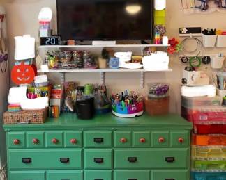 Green painted anthropology dresser (main floor) and craft supplies and tv!